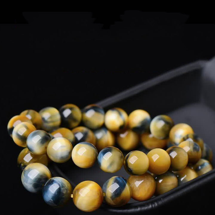 Pulsera de fuerza y valor con protección de ojo de tigre de Buddha Stones