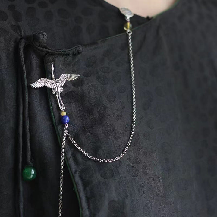 Broche de cobre con diseño de grulla vintage con Buddha Stones