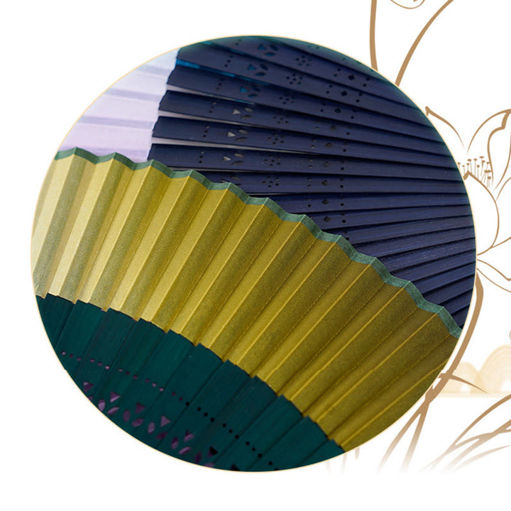 Abanico plegable de bambú de mano grabado hueco de color degradado de Buddha Stones