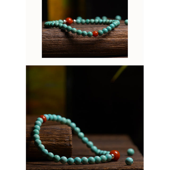 Pulsera de protección de cuentas de ágata roja turquesa de Buddha Stones - image 9