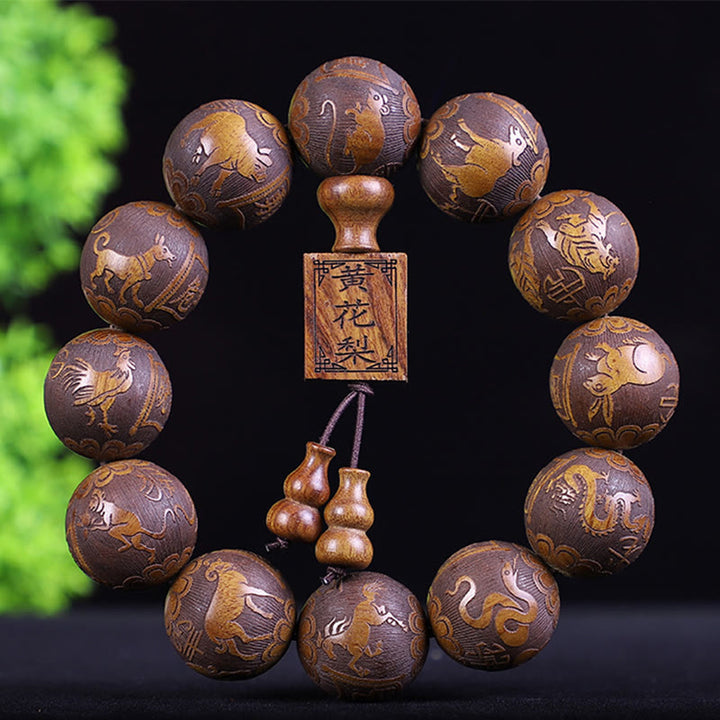 Pulsera de calidez tallada con monedas de cobre, ébano y palisandro del zodiaco chino con Buddha Stones y Pixiu