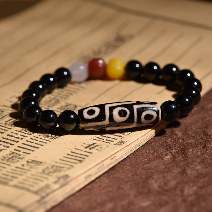 Pulsera de poder de riqueza con cuentas Dzi de nueve ojos naturales tibetanas de Buddha Stones