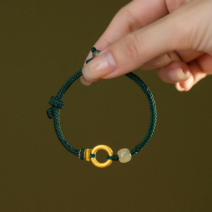 Pulsera trenzada de cuerda verde de la suerte con cuentas de jade hetiano y hebilla de la paz de plata de ley 999 con Buddha Stones