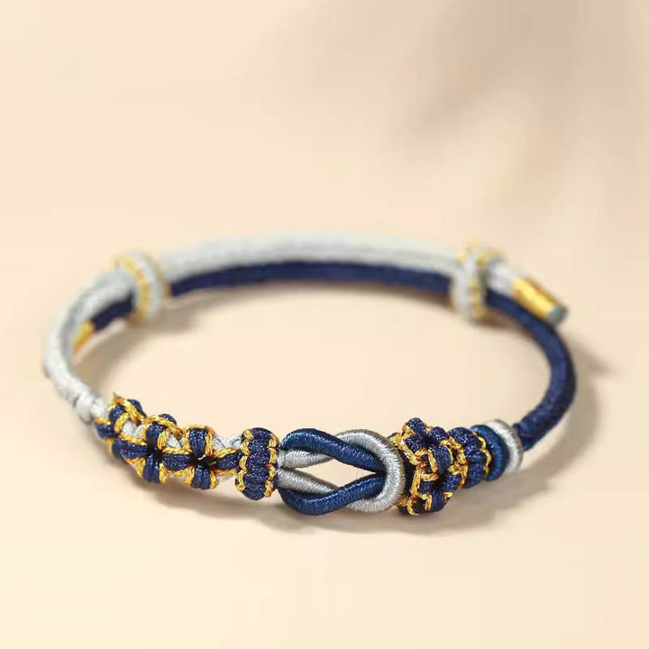 Pulsera de protección de la suerte con nudo de paz de ocho hilos con nudo de flor de melocotón hecho a mano con Buddha Stones
