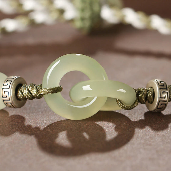 Pulsera trenzada de la suerte con hebilla de la paz y jade hetiano natural de Buddha Stones