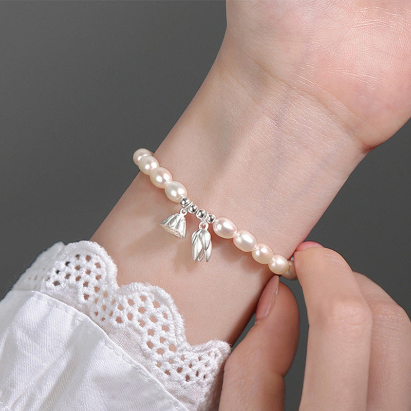 Pulsera curativa de perlas naturales con vaina de flor de loto de plata de ley 999 con Buddha Stones