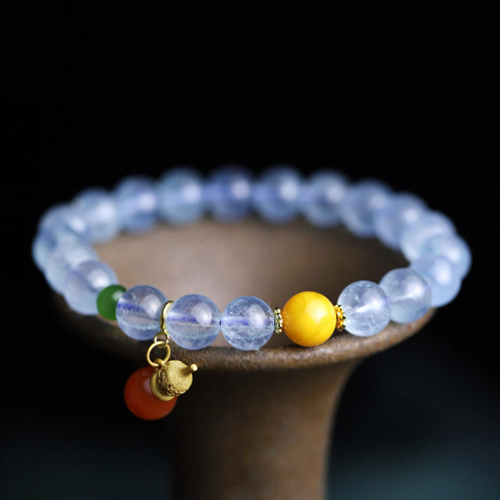 Pulsera con dije de calabaza de la paz con ágata roja y aguamarina