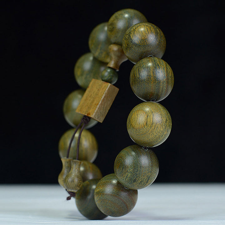 Pulsera curativa de sándalo verde tibetano con Buddha Stones - image 5