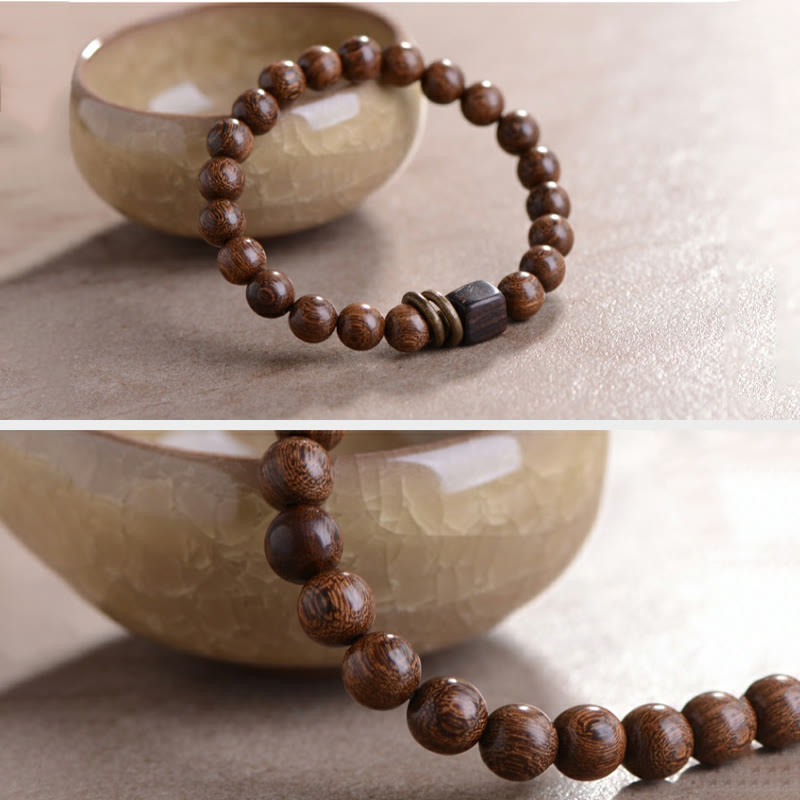 Pulsera de espiritualidad de madera de Phoebe Zhennan con Buddha Stones