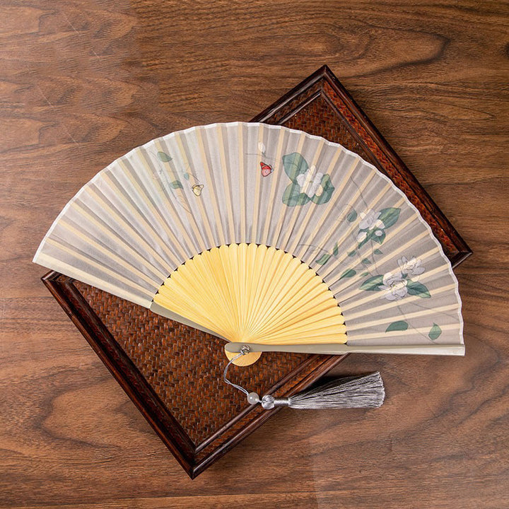 Abanico plegable de bambú de mano con flores de loto jazmín y Buddha Stones