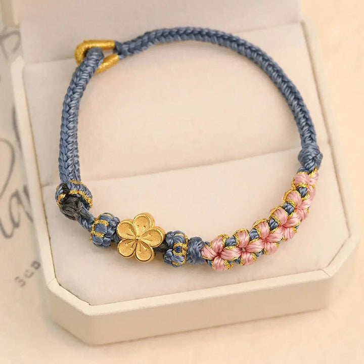 Pulsera de hilo de riqueza con diseño de flor de durazno