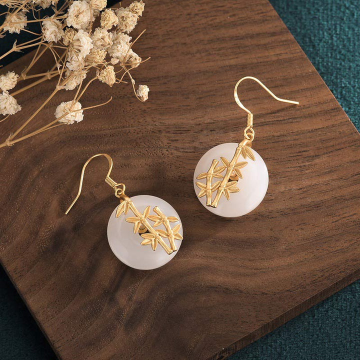 Pendientes de la fortuna de jade blanco FengShui de Buddha Stones
