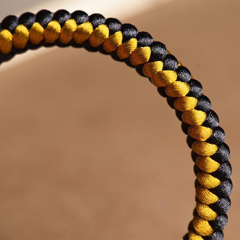 Pulsera de pureza Om Mani Padme Hum de cuerda de dragón de oro negro tibetano hecha a mano con Buddha Stones