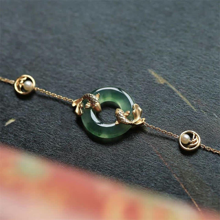 Pulsera de armonía curativa con peces Koi de jade cian y Buddha Stones