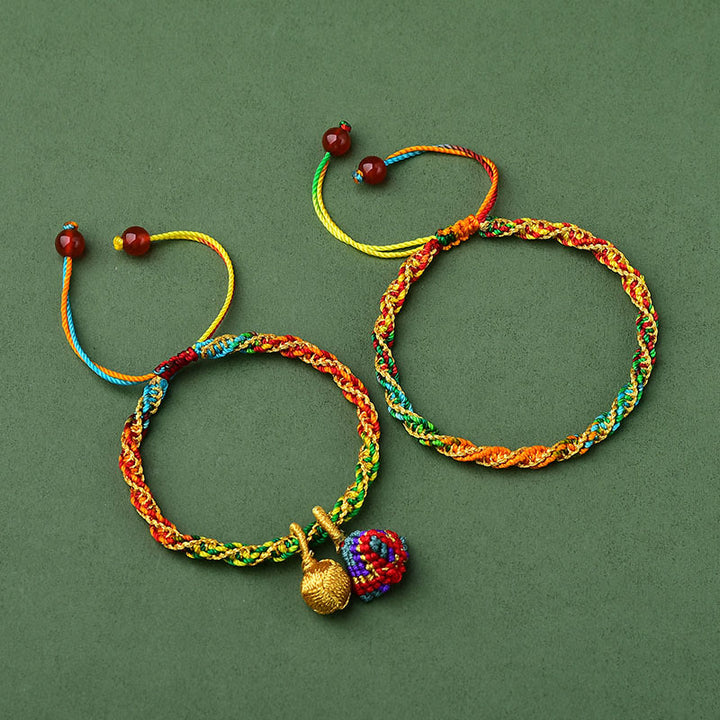 Pulsera con dijes Zongzi hecha a mano con cuerda colorida y Buddha Stones