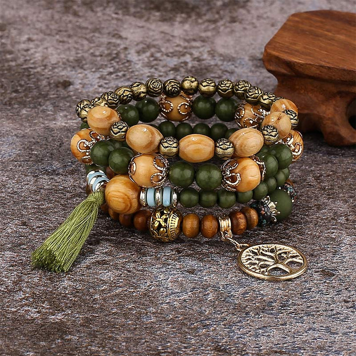 Pulsera curativa con borlas de árbol en capas de madera de wengué