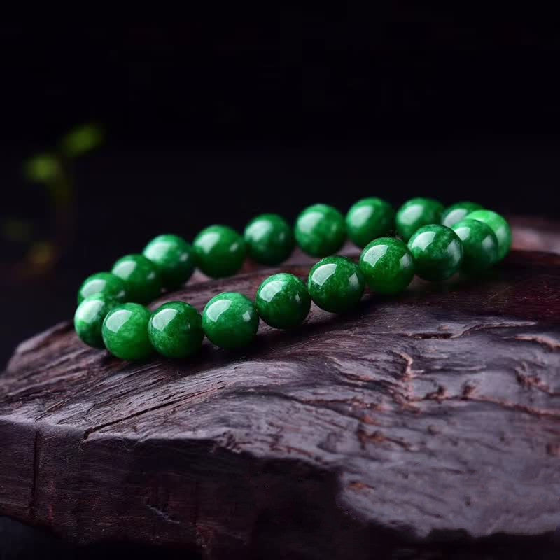 Pulsera de armonía tranquila con cuentas de jade cian y piedras de Buddha Stones