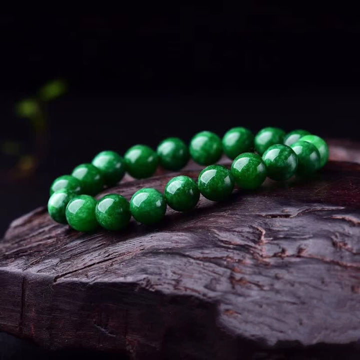 Pulsera de armonía tranquila con cuentas de jade cian y piedras de Buddha Stones