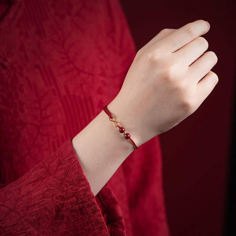 Pulsera tobillera con símbolo del infinito dorado y hilo rojo con bendición de cinabrio y Buddha Stones - image 1