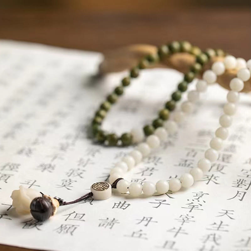 Pulsera calmante de semillas de Bodhi de sándalo verde natural con Buddha Stones