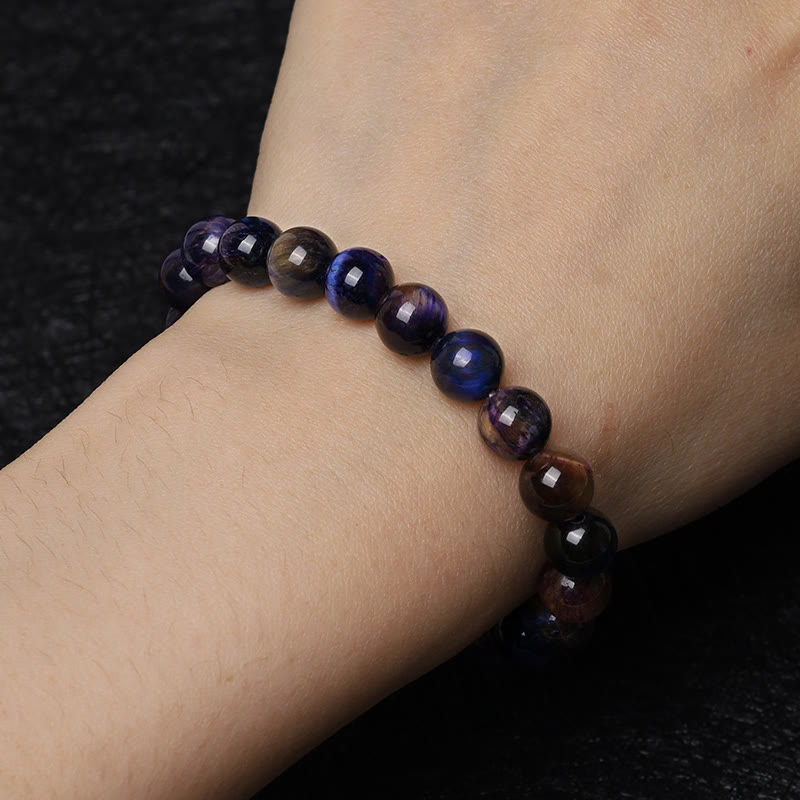 Pulsera de fuerza de protección de ojo de tigre púrpura natural de Buddha Stones