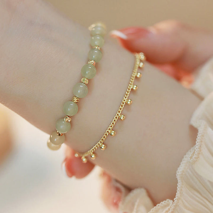 Pulsera de prosperidad de la suerte con cuentas de jade hetiano de 2 capas chapada en oro de 14 quilates