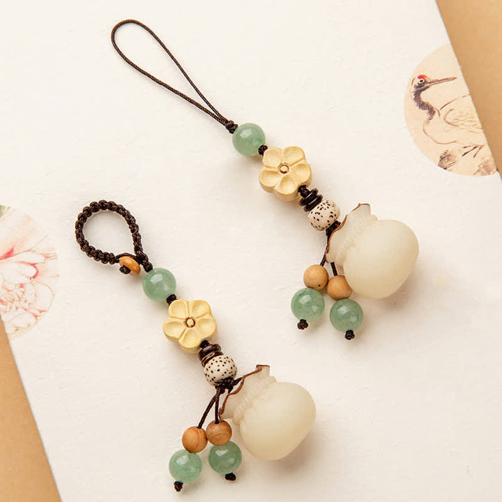 Llavero de prosperidad y bendición de flores, bolsa de dinero con semillas de Bodhi Natural, Buddha Stones