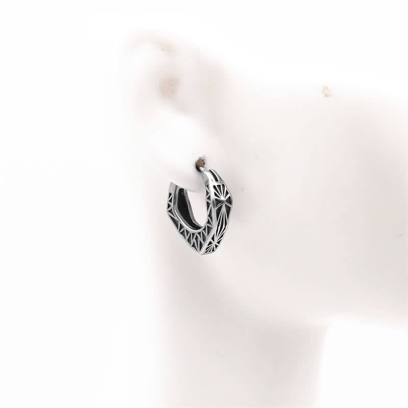 Pendientes de equilibrio de acero y titanio con aro vikingo