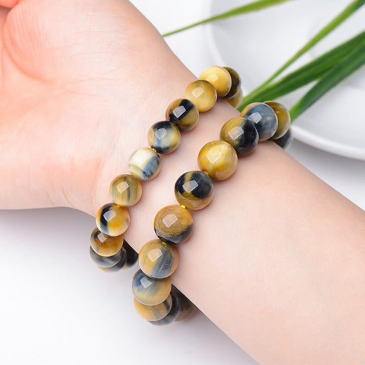 Pulsera de fuerza y valor con protección de ojo de tigre de Buddha Stones