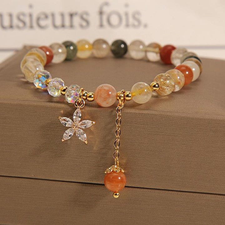 Pulsera de flores de circonio auspicioso de cuarzo rutilado multicolor con Buddha Stones