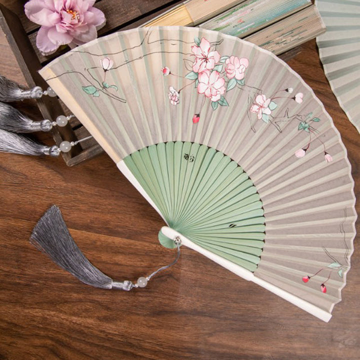 Abanico plegable de bambú de mano con flores de loto jazmín y Buddha Stones