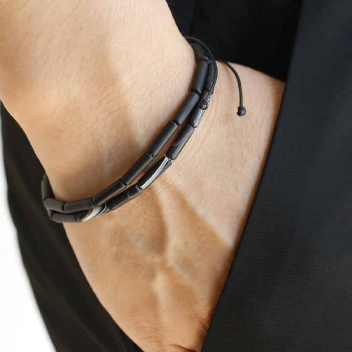 Pulsera de protección de soporte de cuentas de ónix negro con Buddha Stones
