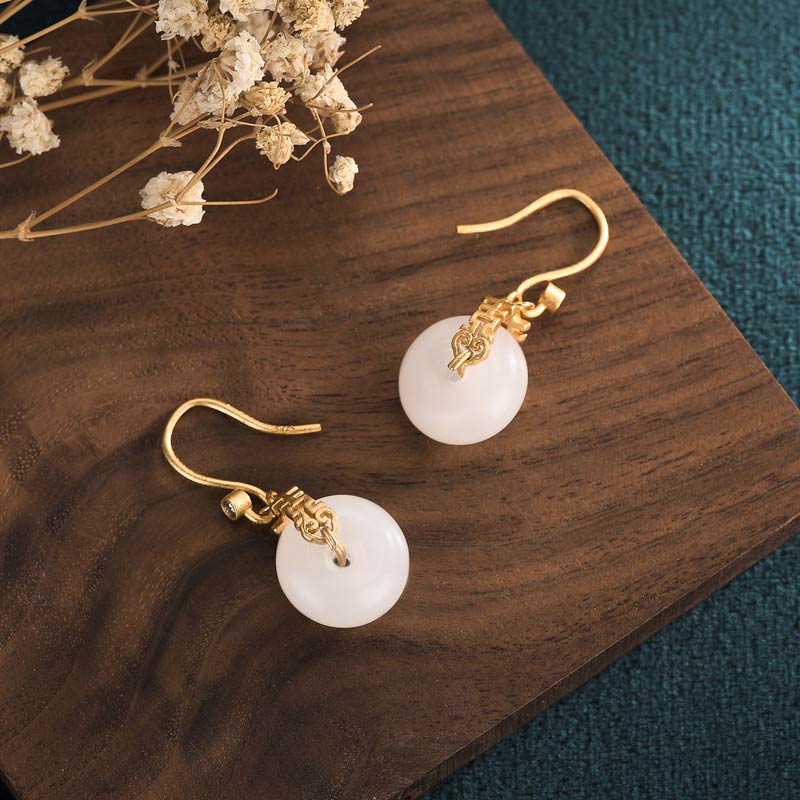Pendientes de la fortuna de la doble felicidad del jade blanco de las Buddha Stones
