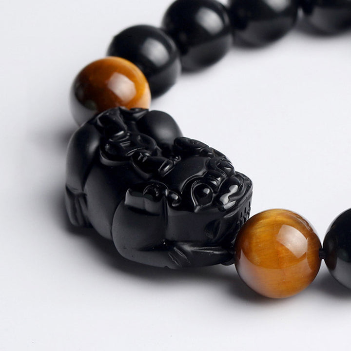 Pulsera de riqueza de ojo de tigre de obsidiana arcoíris FengShui PiXiu de Buddha Stones