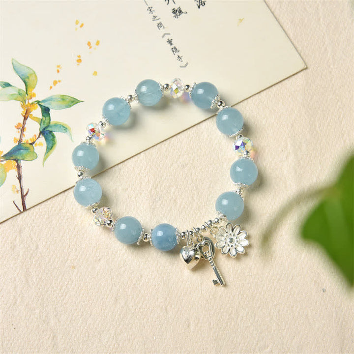 Pulsera con dije de llave de amor con flor de serenidad de aguamarina natural de plata de ley 925