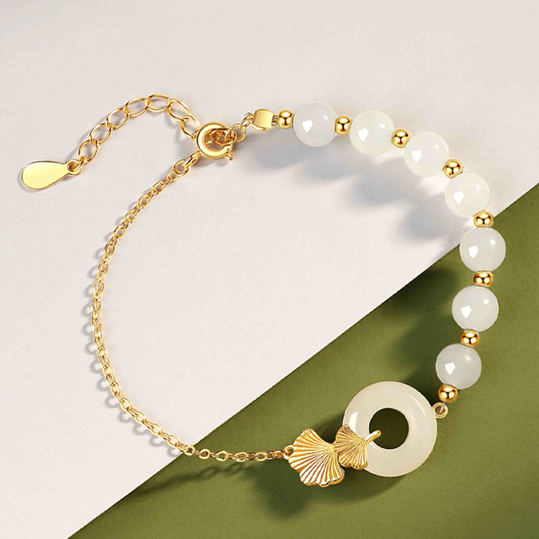 Pulsera de la suerte de hoja de ginkgo con hebilla de paz de jade blanco hetiano de plata de ley 925 con Buddha Stones