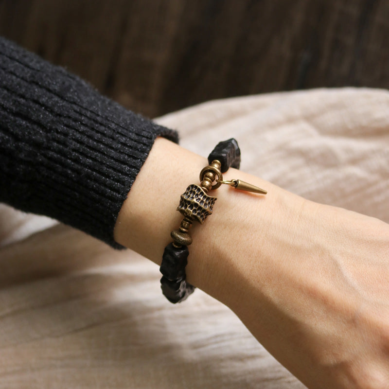 Pulsera de pareja con protección de equilibrio de cobre y madera de ébano con Buddha Stones