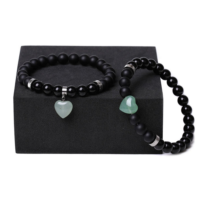 Buddha Stones 2 piezas de piedra de cristal de ónix negro amor protección del corazón pulsera de pareja