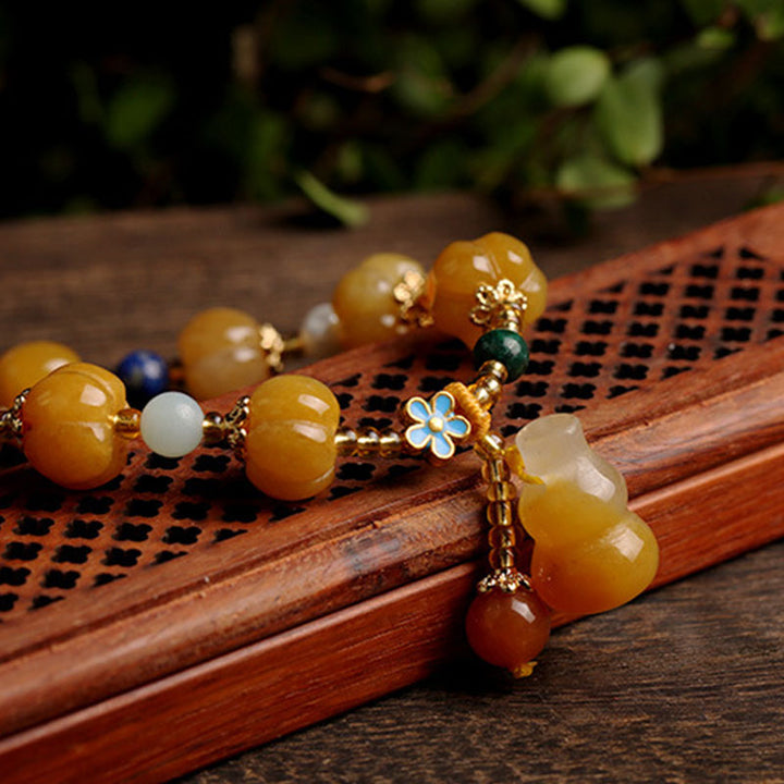 Pulsera de riqueza Pixiu de jade de seda dorada con Buddha Stones
