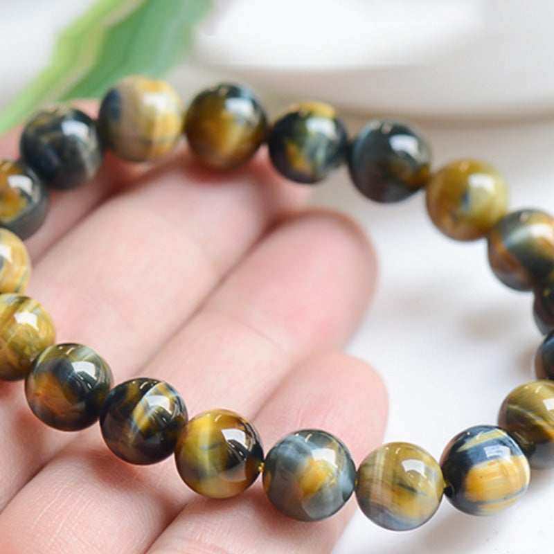 Pulsera de fuerza y valor con protección de ojo de tigre de Buddha Stones