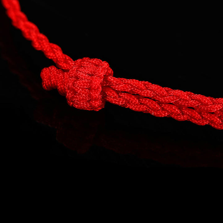 Pulsera de hilo trenzado hecha a mano con pez Koi de la suerte de oro 999 de Buddha Stones