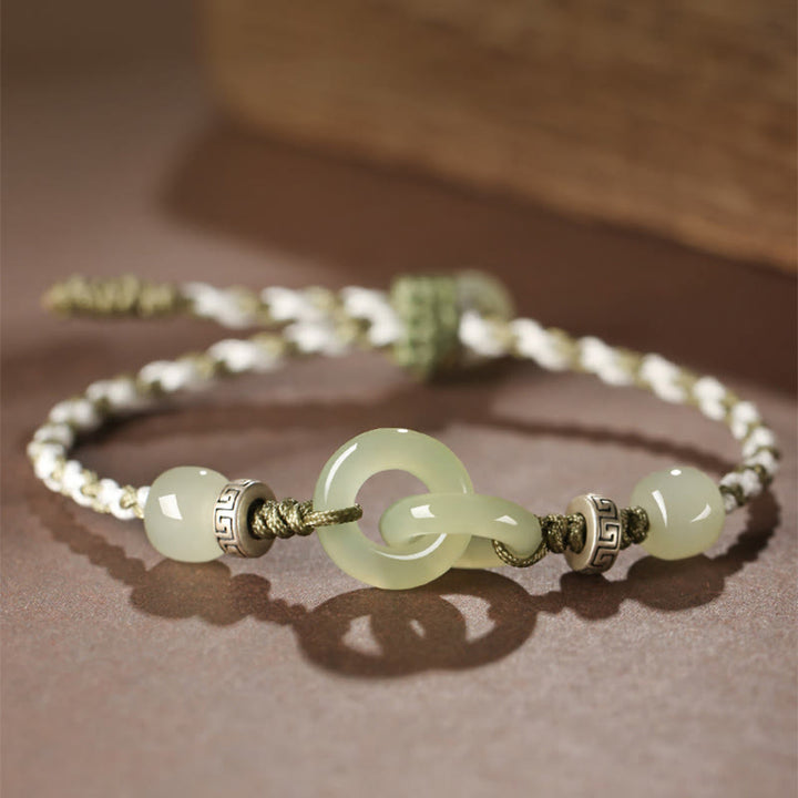 Pulsera trenzada de la suerte con hebilla de la paz y jade hetiano natural de Buddha Stones
