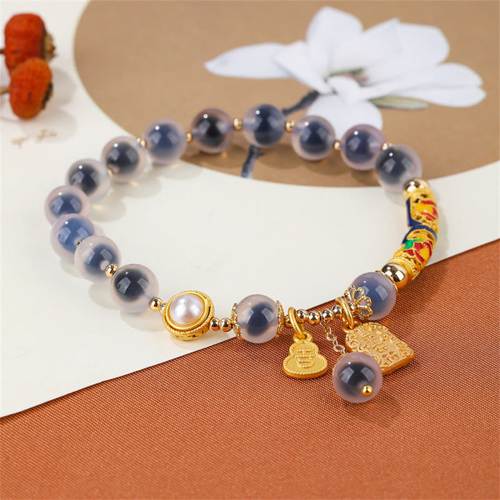 Pulsera de fuerza con amuleto de ágata de caramelo azul natural con Buddha Stones