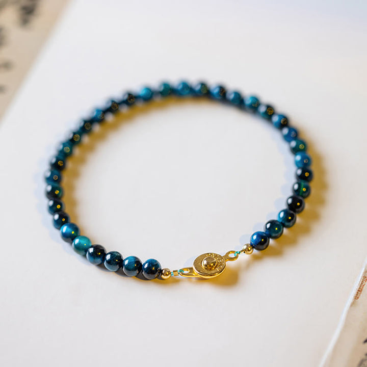 Pulsera de cadena de protección con piedra de ojo de tigre azul natural de Buddha Stones
