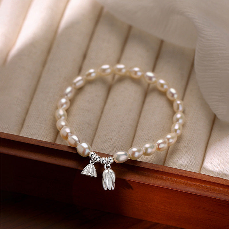 Pulsera curativa de perlas naturales con vaina de flor de loto de plata de ley 999 con Buddha Stones