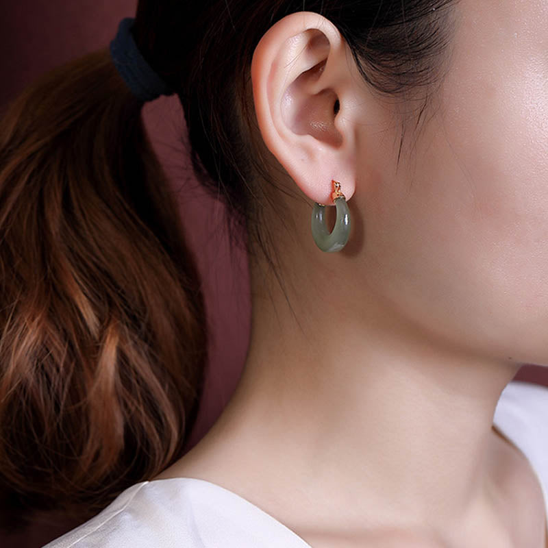 Pendientes colgantes de suerte de prosperidad de jade cian redondo de Buddha Stones