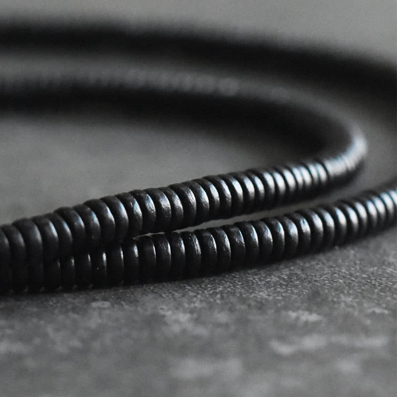 Pulsera multicapa con Buddha Stones, madera de ébano, latón y cobre - image 10