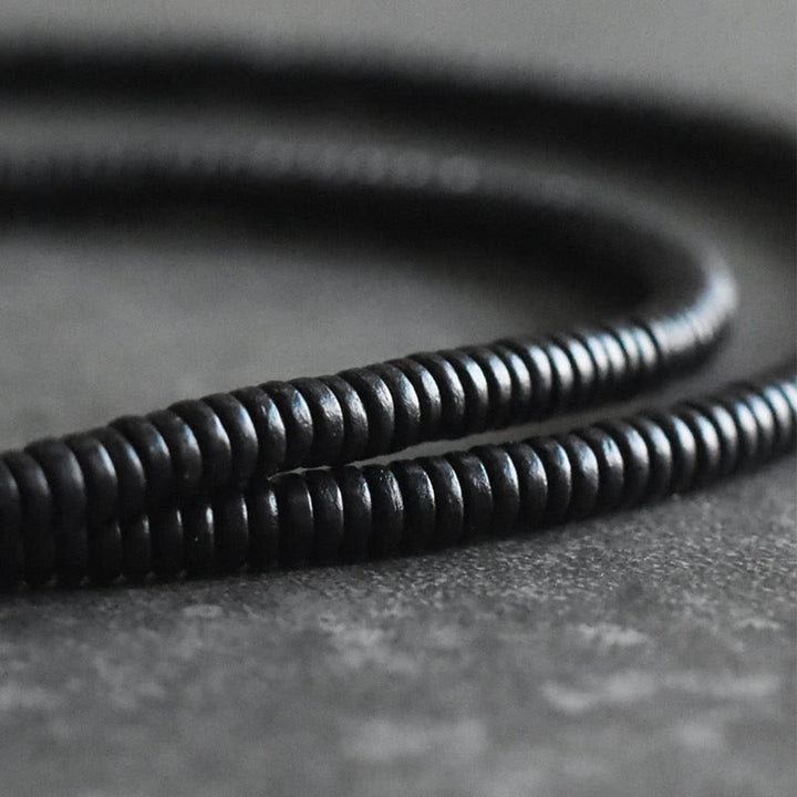 Pulsera multicapa con Buddha Stones, madera de ébano, latón y cobre - image 10