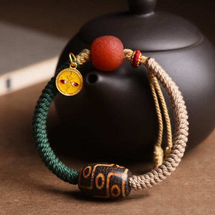 Pulsera de cuerda de riqueza con cuentas Dzi tibetanas de nueve ojos hechas a mano con Buddha Stones