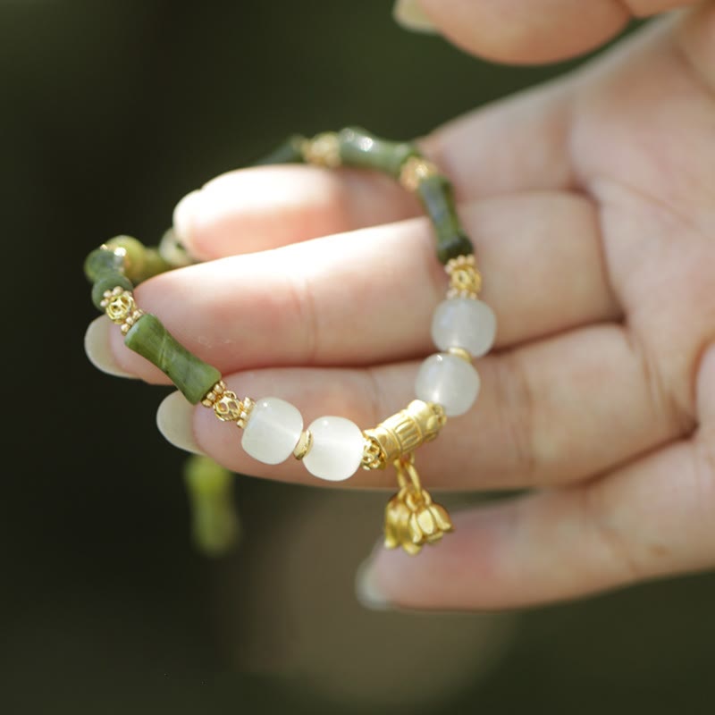 Pulsera de riqueza con Buddha Stones, bambú verde, jade, lirio de los valles